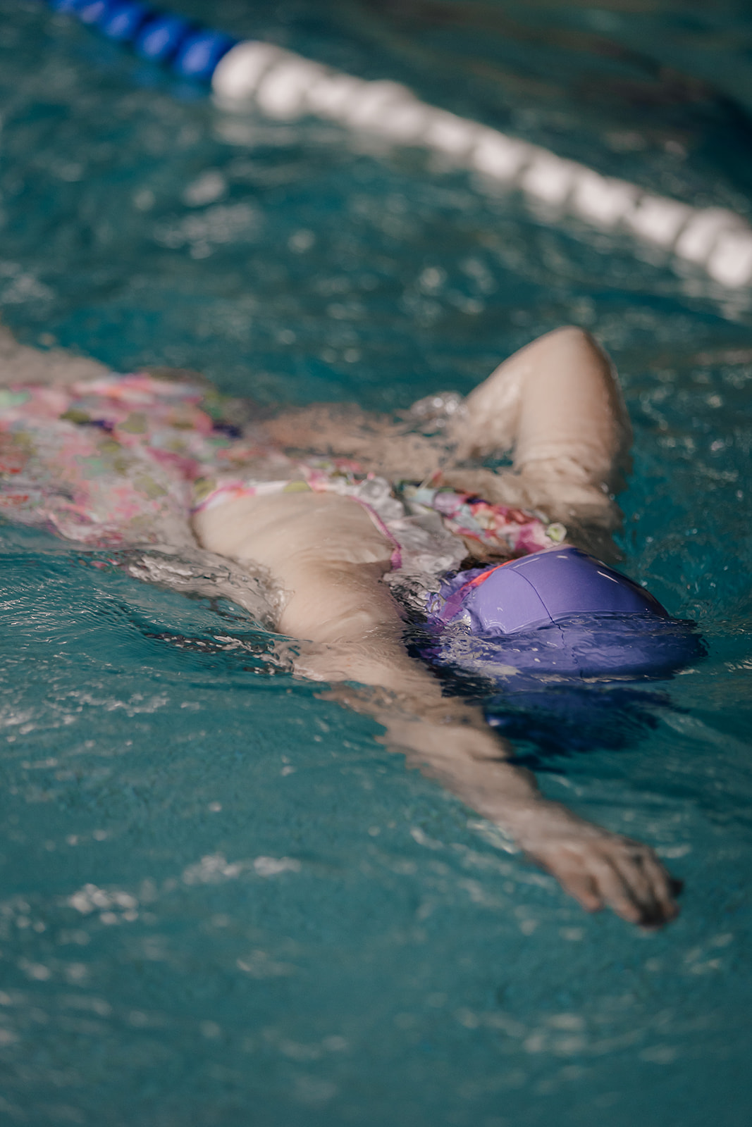 Child swimming freestyle