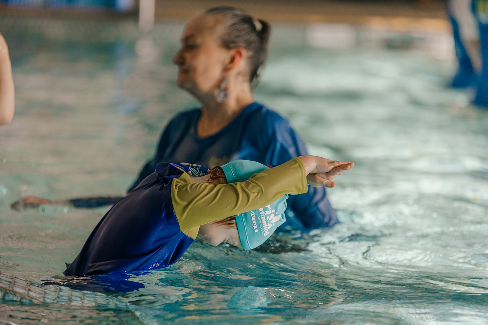 child practising dive technique